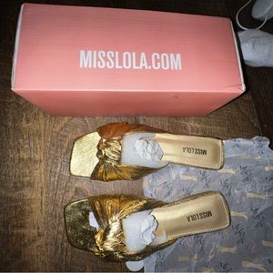 Pretty golden flats. Never worn!